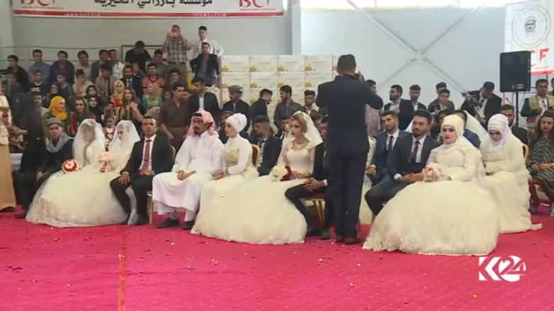 بالصور.. اربيل تحتضن عرسا جماعيا لـ 214 شابا وشابة